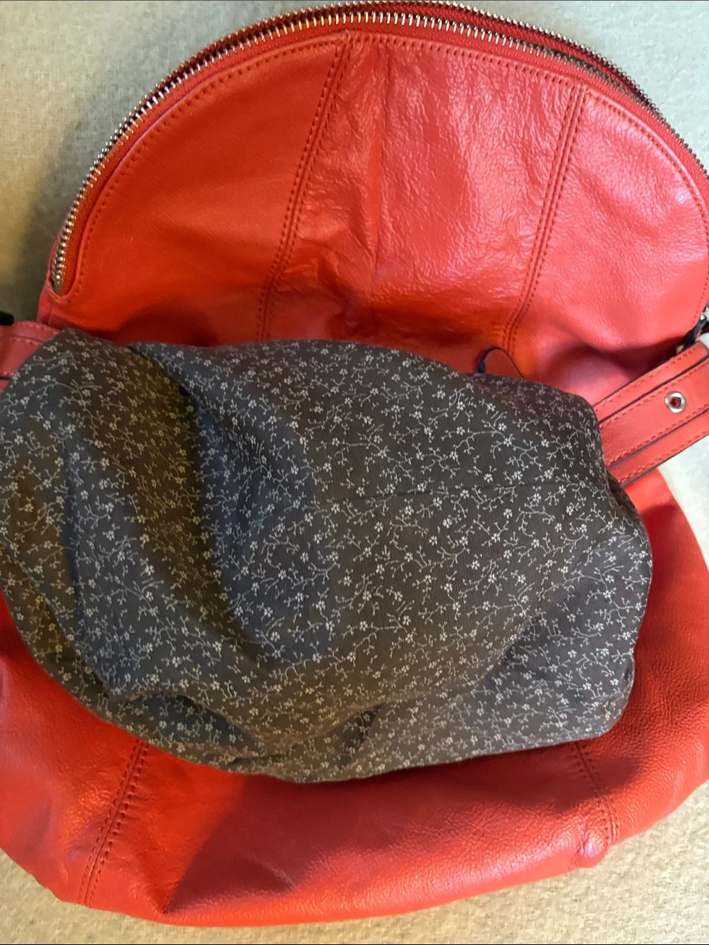 Vibrant Red Leather Shoulder Bag with Curved Zip Flap